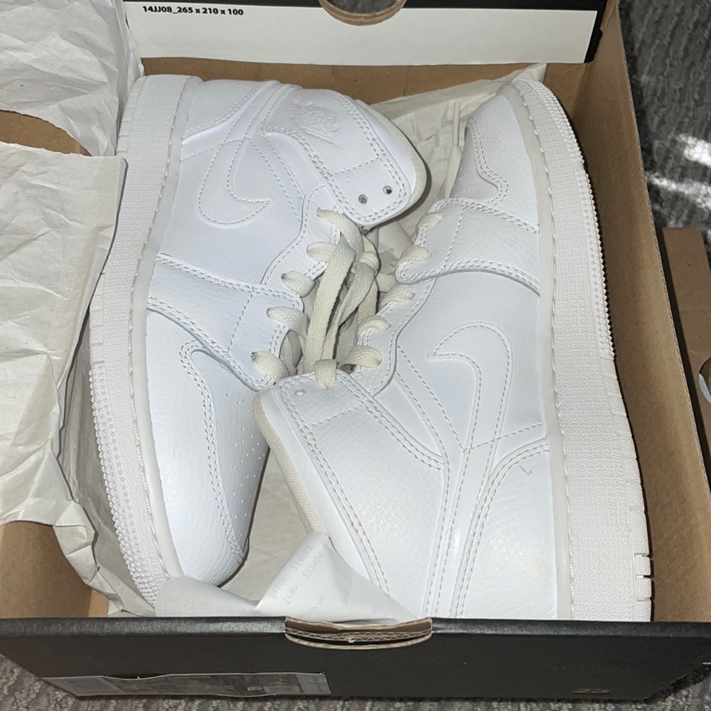 All white Air Jordan 1 mid
